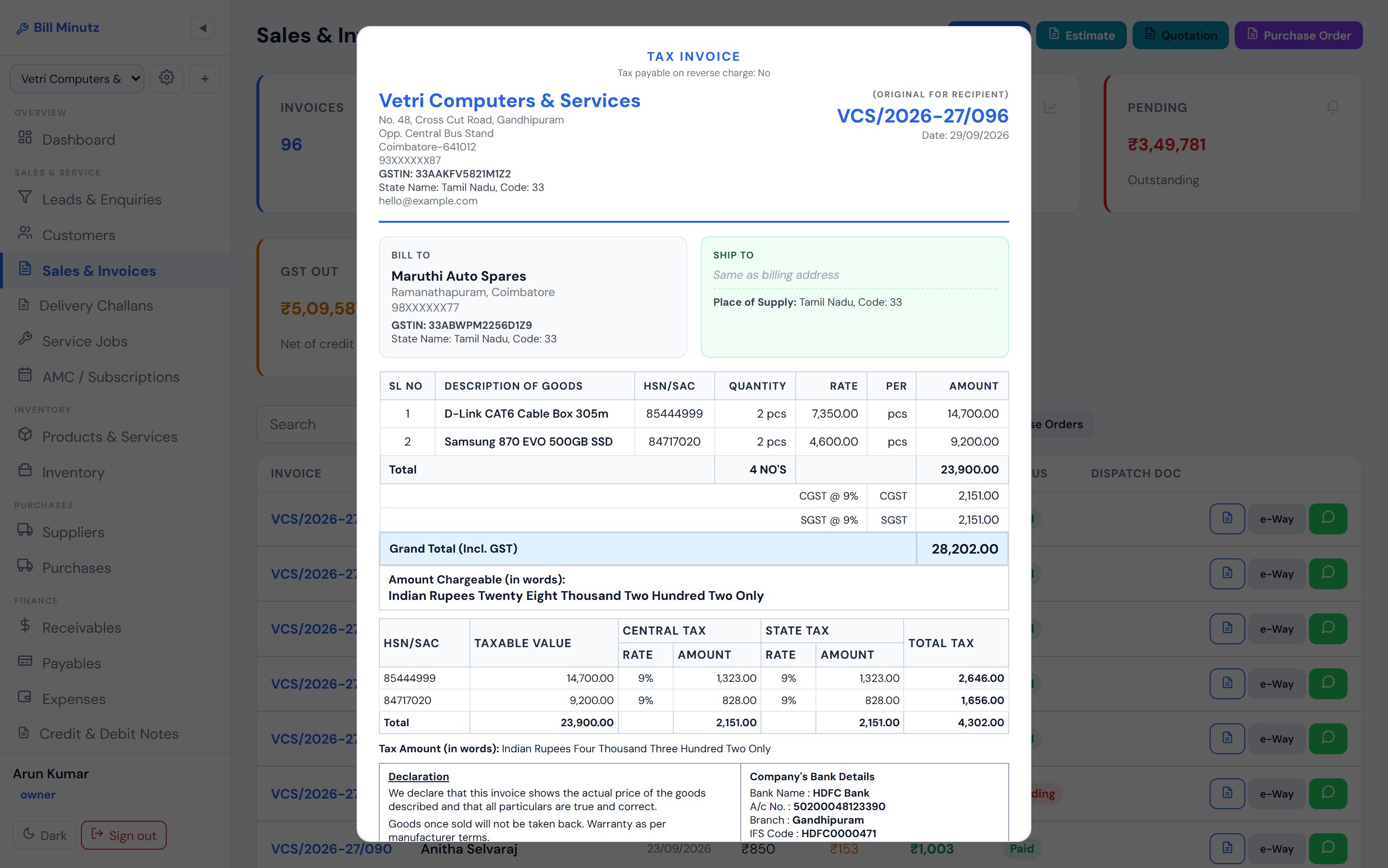 A GST tax invoice with HSN codes, equal CGST and SGST, amount in words and bank details
